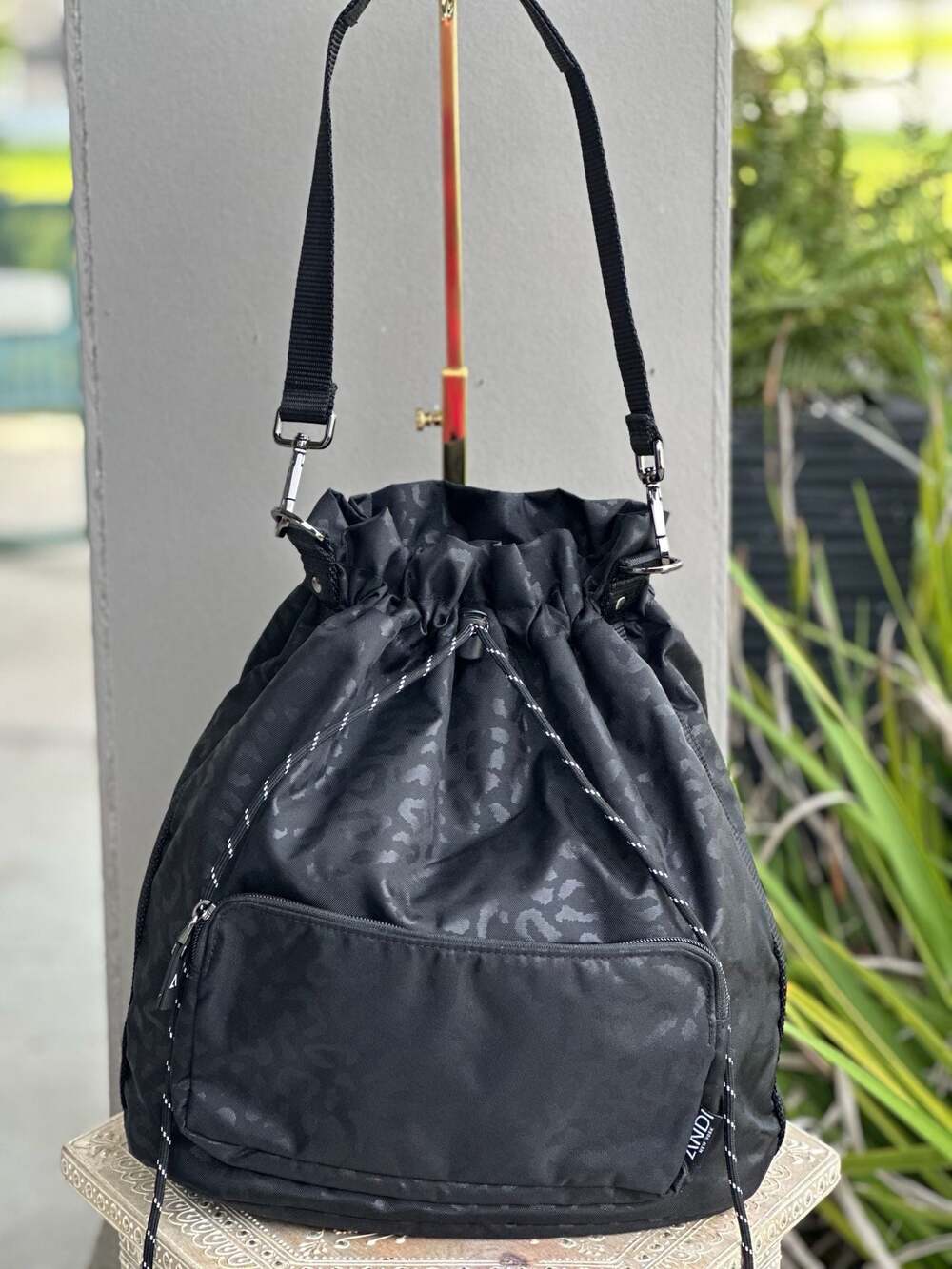 ANDI New York Black Leopard Print Drawstring Bucket Bag (discontinued)
